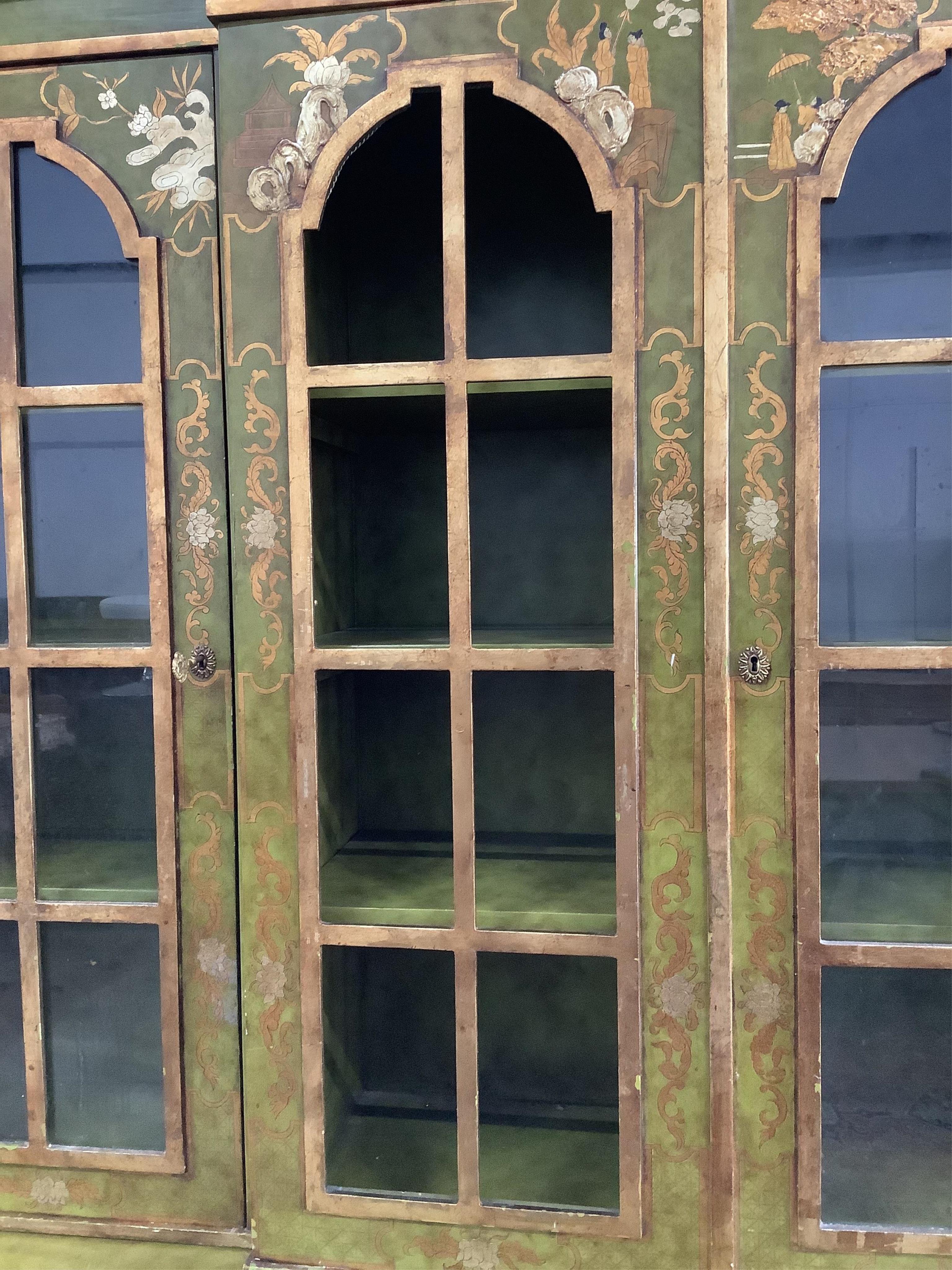 A George III style green chinoiserie lacquer breakfront library bookcase, width 196cm, depth 56cm, height 238cm. Condition - poor to fair